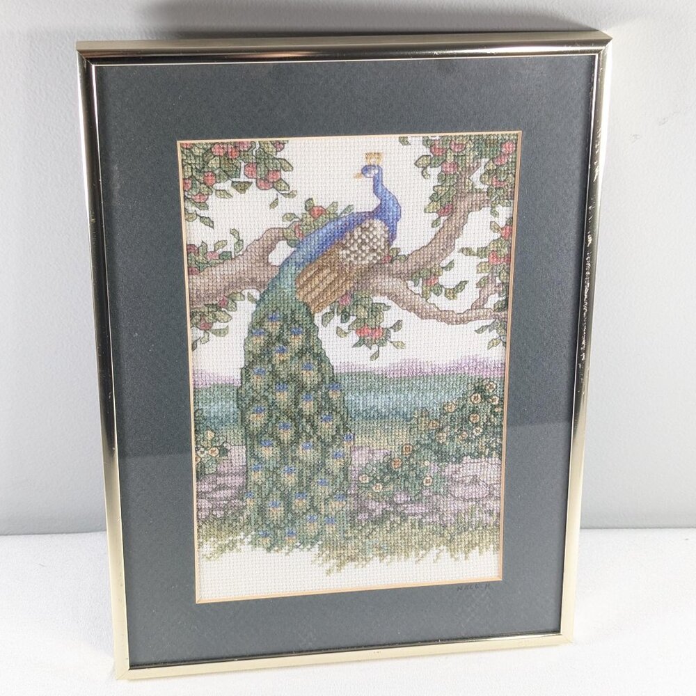 Vintage cross stitch wall art peacock in apple tree framed and behind glass,